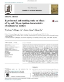 Experimental and modeling study on effects of N2 and CO2 on ignition characteristics of methane/air mixture