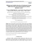 Efficient and reliable detection of rhodamine B using SERS from silver-decorated nanoporous silicon photonic crystal