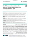 Mindfulness is not associated with dissonant attitudes but enhances the ability to cope with them