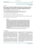 Báo cáo y học: Endovascular Treatment of Bilateral Carotid Artery Occlusion with Concurrent Basilar